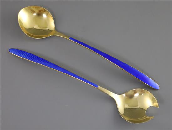 A pair of 1960s Norwegian sterling silver gilt and blue enamel salad servers by David Andersen, 156 grams.